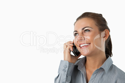Close up of businesswoman on the phone looking diagonally upward