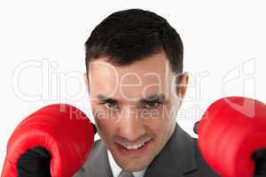 Close up of businessman with boxing gloves on