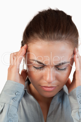 Close up of businesswoman having a headache