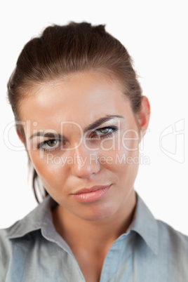 Close up of unhappy businesswoman