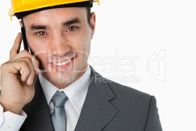 Close up of architect calling customer