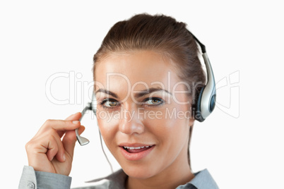 Close up of talking female call center agent