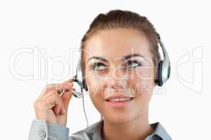 Close up of female call center agent listening closely