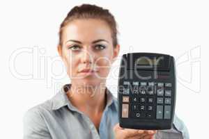 Female accountant presenting calculator