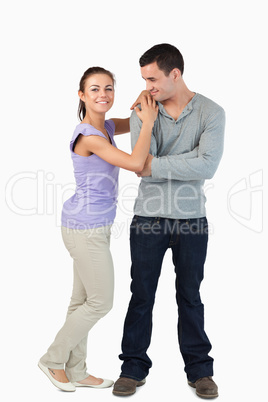 Young female leaning on her boyfriend's shoulder