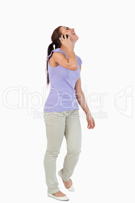 Happy young female on the phone