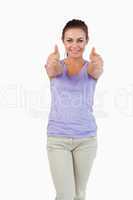 Young female giving thumbs up