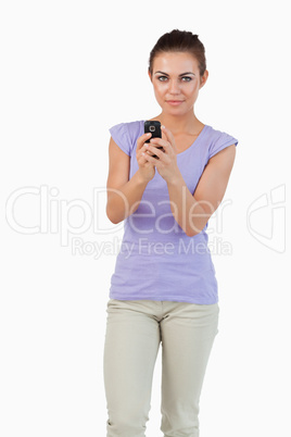 Young female holding her cellphone