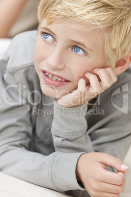 Blond Hair Blue Eyes Boy Child Resting on His Hands
