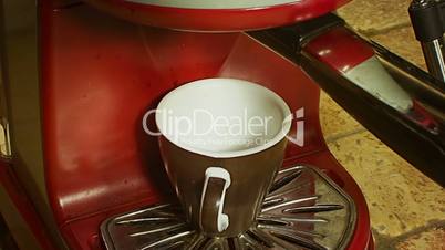 Coffee cup pouring from machine 1