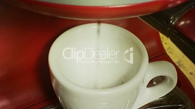 Coffee cup pouring from machine 2