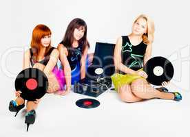 Three pretty girls with gramophone