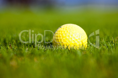 Yellow ball for a golf