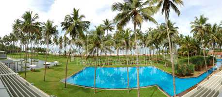 The panorama of swimming pool and beach of luxury hotel, Bentota