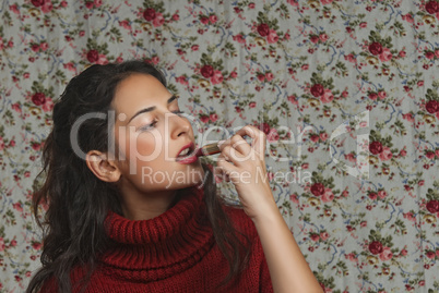 Woman with lipstick with floral background