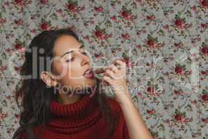 Woman with lipstick with floral background