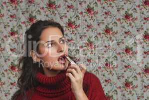 Woman with lipstick with floral background