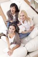 Three Beautiful Women Friends Eating Popcorn at Home