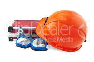 Orange helmet, suitcase and goggle