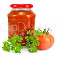 Tomato ketchup with tomato and parsley