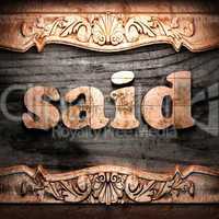 Golden word on wood