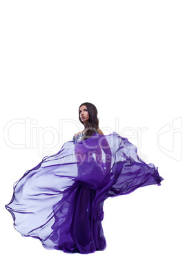 arabia dancer posing in oriental flying fabric