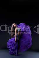 arabia dancer posing with flying fabric