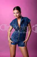 Pretty young woman portrait in jeans suit