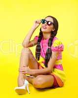 Cute girl like doll dress look in stereo glasses