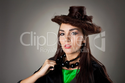 Woman portrait in hair style like hat