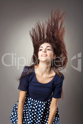 Beauty young woman retro style - hairs blow up