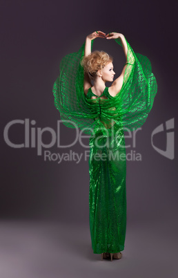 Beauty woman dance in transparent green cloth