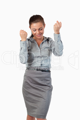 Portrait of businesswoman with the fists up