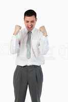 Portrait of a young businessman with the fists up