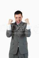 Portrait of a businessman with the fists up