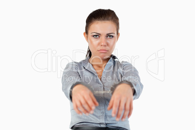 Young businesswoman with handcuffs