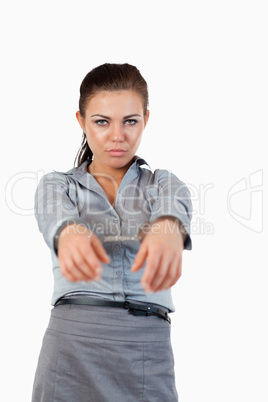 Portrait of a young businesswoman with handcuffs