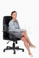 Portrait of a businesswoman sitting on an armchair