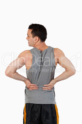 Portrait of a man having a back pain