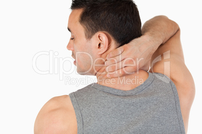 Young man having a back pain