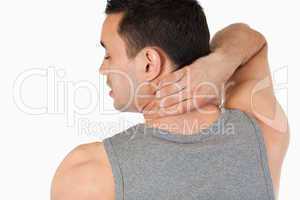 Young man having a back pain