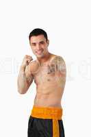 Smiling young martial art fighter