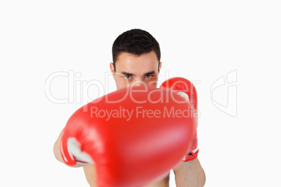 Boxer attacking with right fist