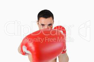 Boxer attacking with right fist