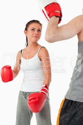Young female in martial arts training