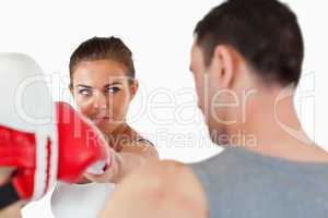 Young female listening to instructor