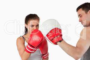 Female boxer focused on her target