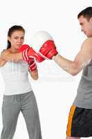 Young female boxer practicing