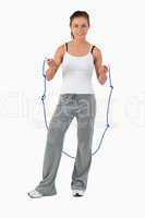 Young woman about to start jump roping