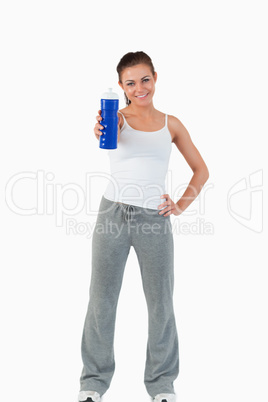 Smiling woman offering a sip of water